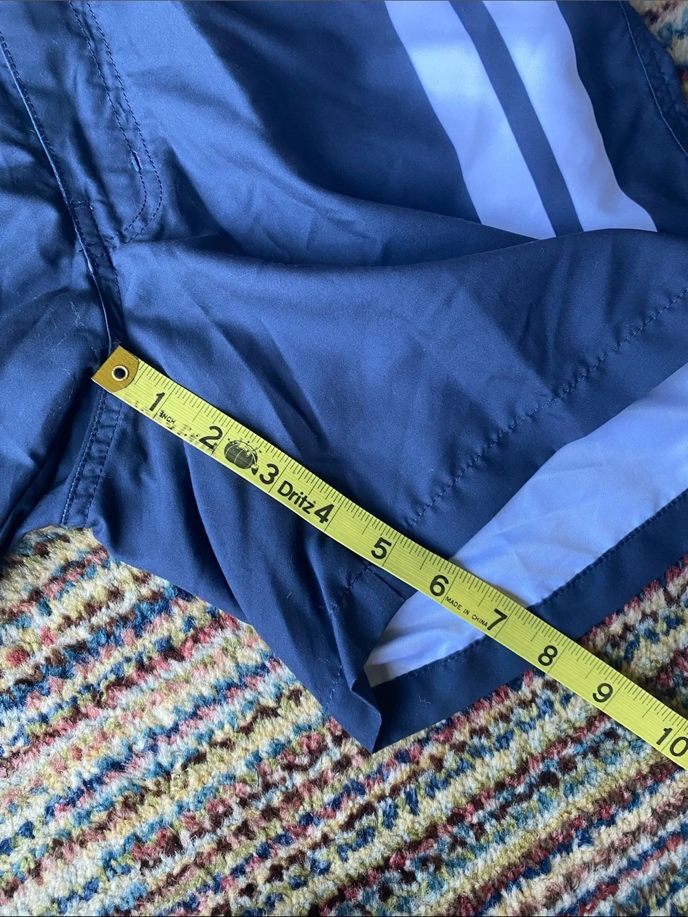 Retromarine navy swim trunks with white stripes
